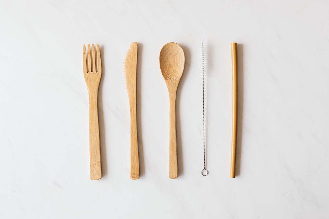 Crafting Captivating Headlines: Your awesome post title goes here 4 Minimalist wooden cutlery set on marble for eco-friendly dining